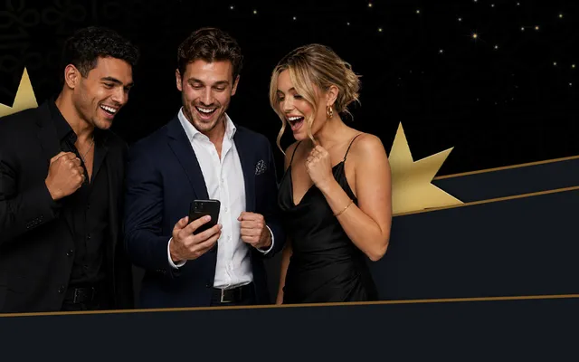 TheClubhouse Casino players celebrating a win on a phone